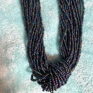 Beaded knot necklace - gorgeous blues, purples, greens, and maroon colors